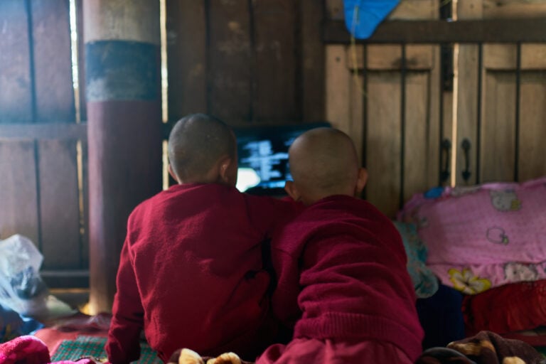 Monks watching film