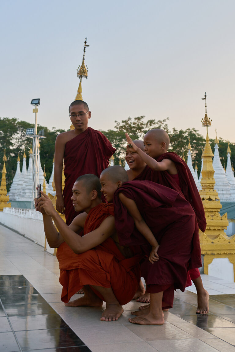 Monks taking photos